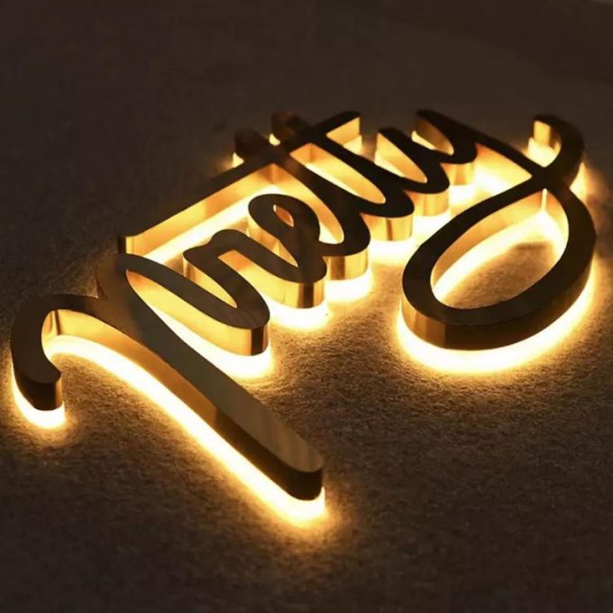 Letreiros luminosos para loja em 3D com LED em aço inoxidável e tinta dourada para lojas Sinalização comercial luminosa